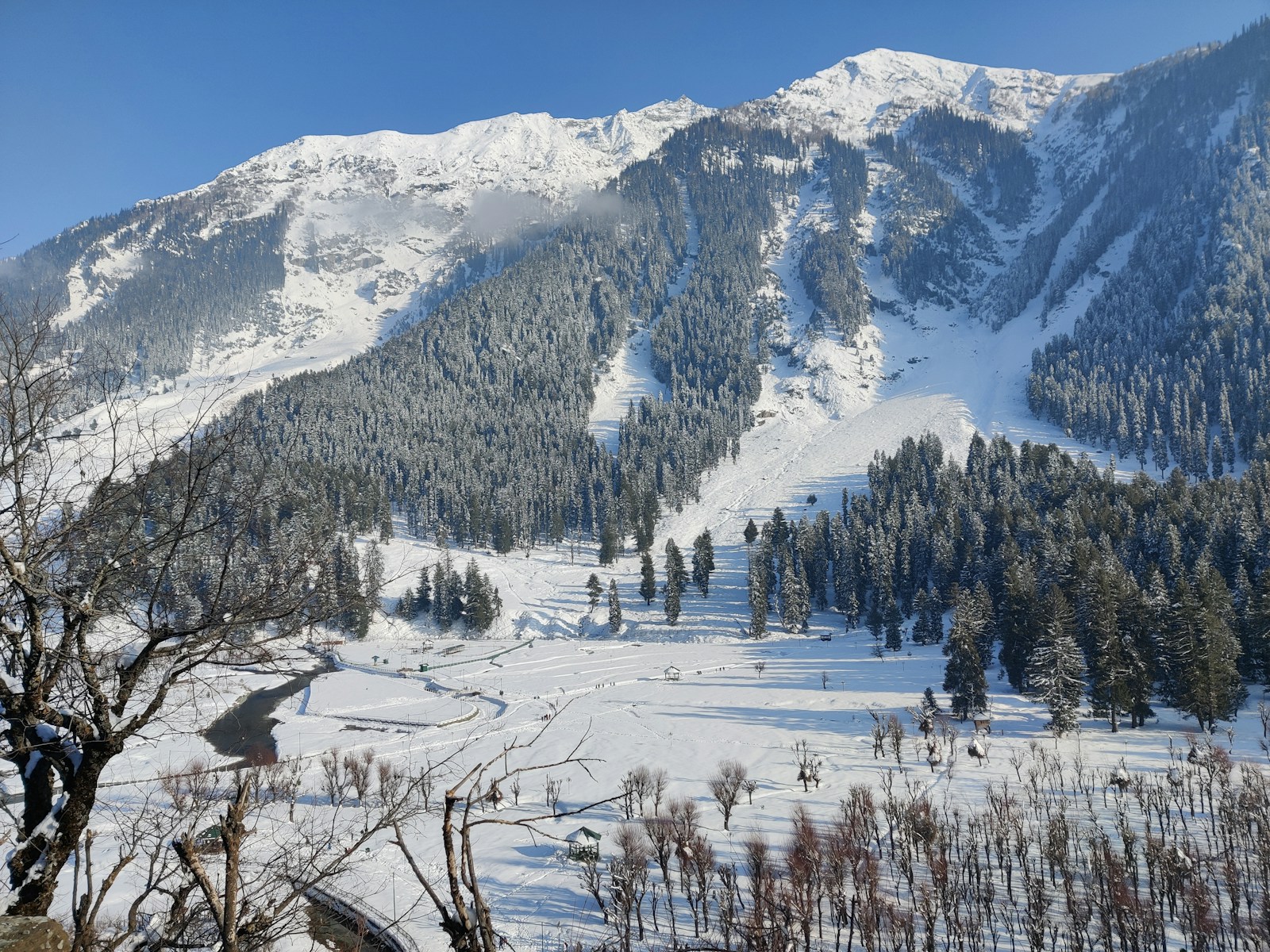 snow covered mountain during daytime